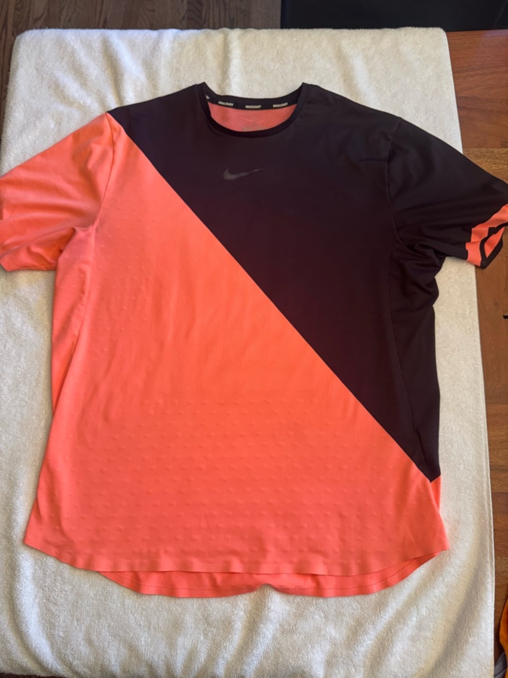 Nike Men’s Short-Sleeve Diagonal Colorblock Drifit tee. Black and Coral.